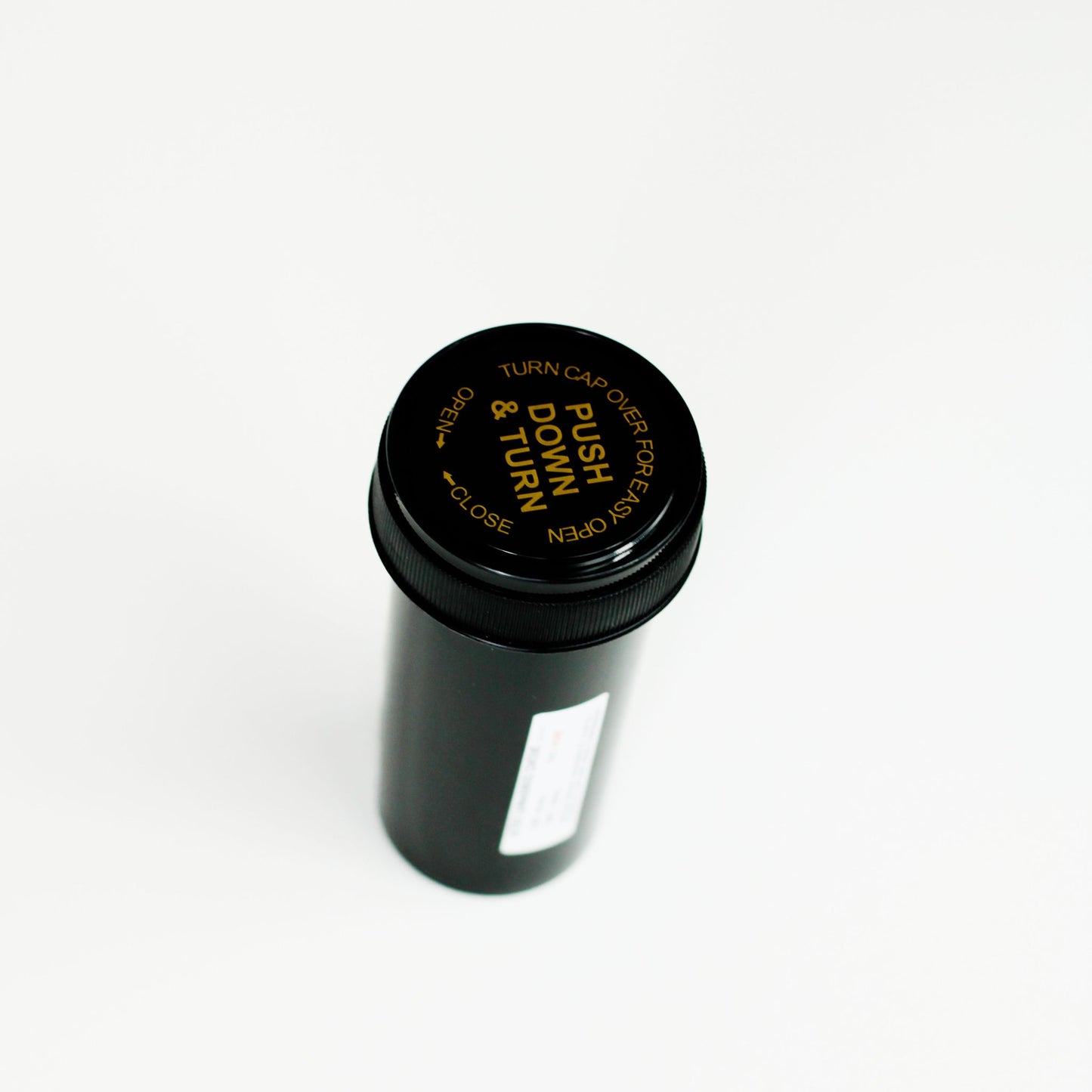 black child resistant pill bottle lid