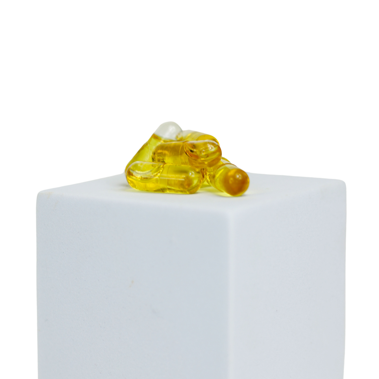 cbd oil capsules on white box