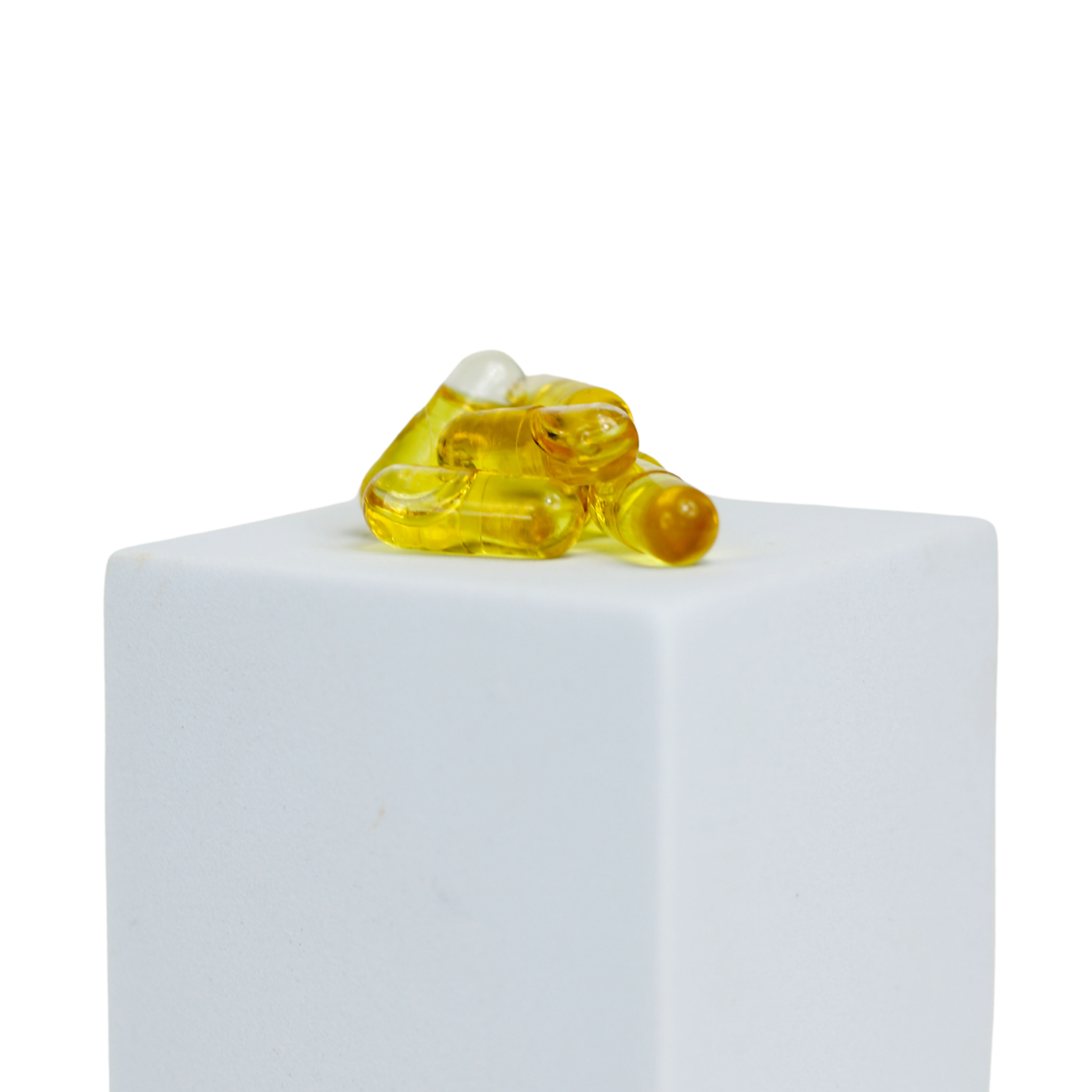 cbd oil capsules on white box